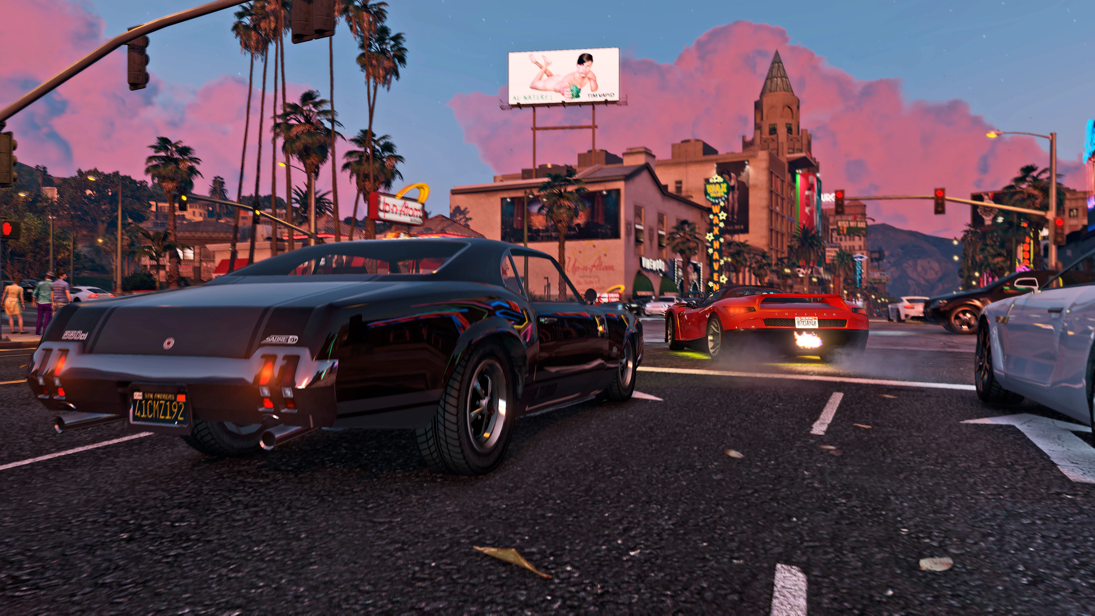 Picture cars arriving beneath the marquees of Vinewood at dusk