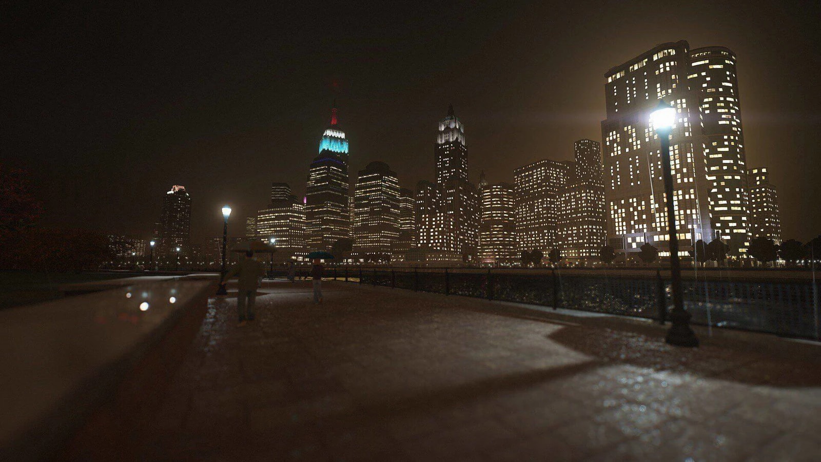 Liberty City towers and streets illuminated at night